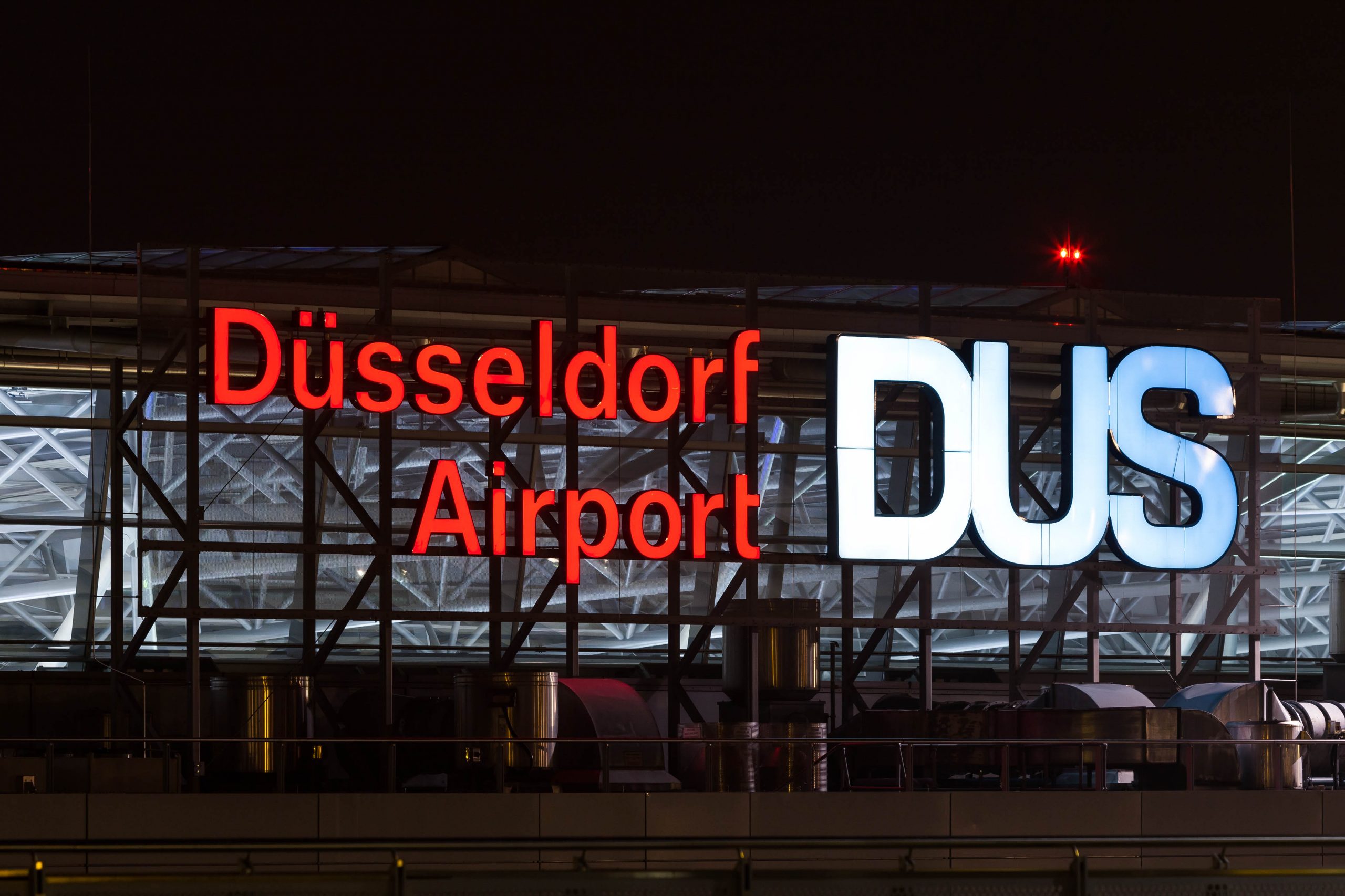 duesseldorf airport germany sign at night